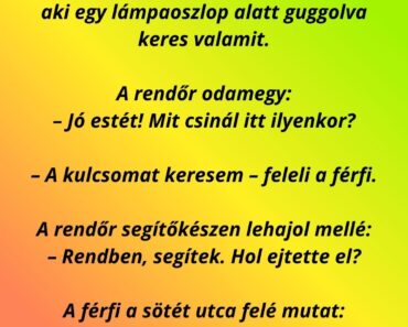 Egy rendőr járőrözik éjszaka a városban.